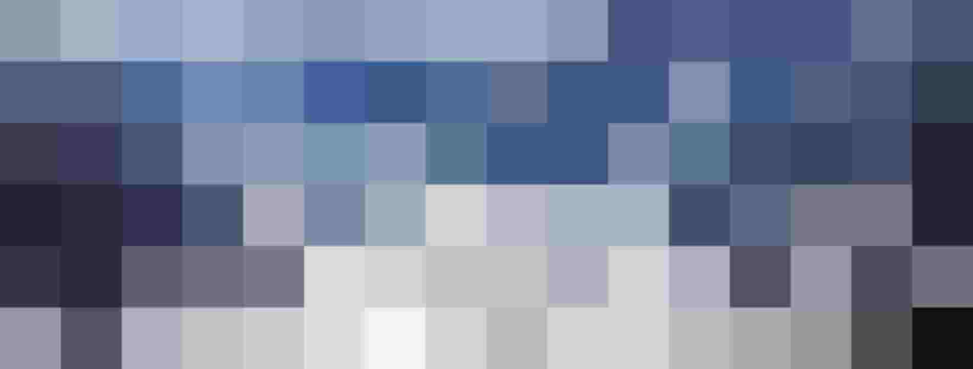 Winterliche Berglandschaft mit Rauris im Tal, umgeben von schneebedeckten Höhenlagen.